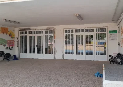 Puertas practicables 2 hojas + 2 fijos y montante